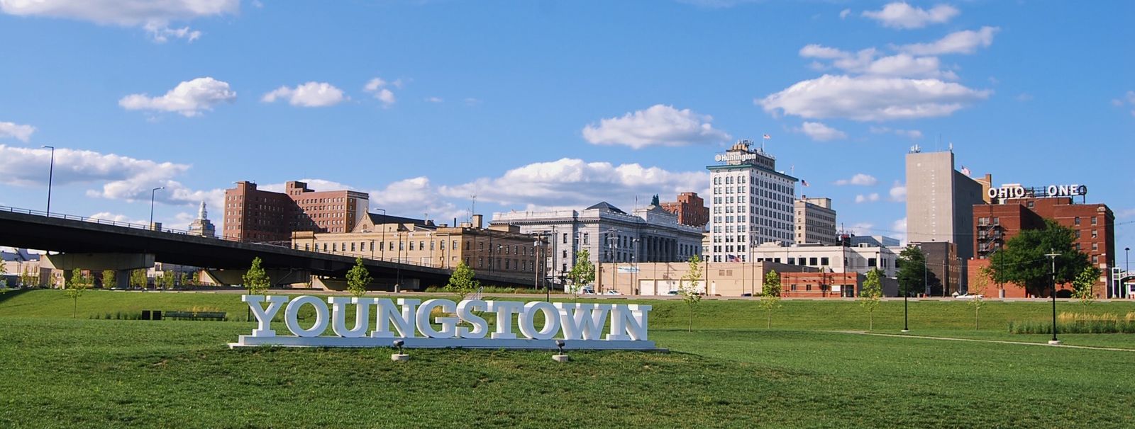 The YOUNGSTOWN sign at Wean Park with the downtown skyline behind it.
